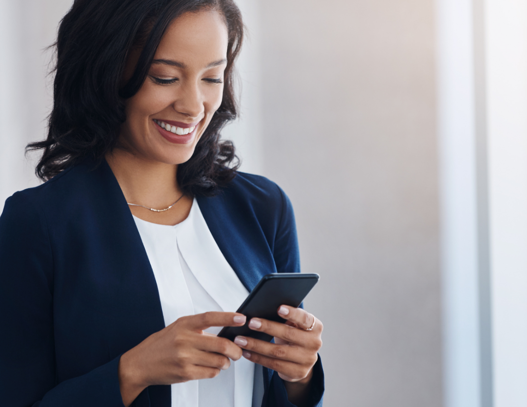 Person reading a message on her phone